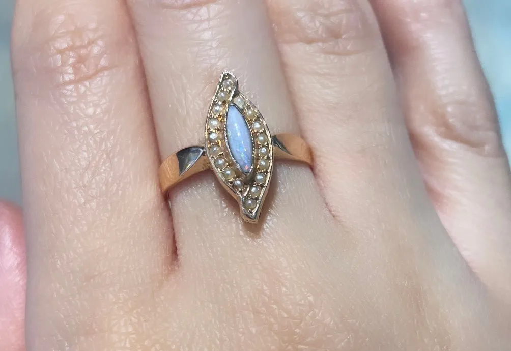 Marquise opal and seed pearl ring in 14 carat gold