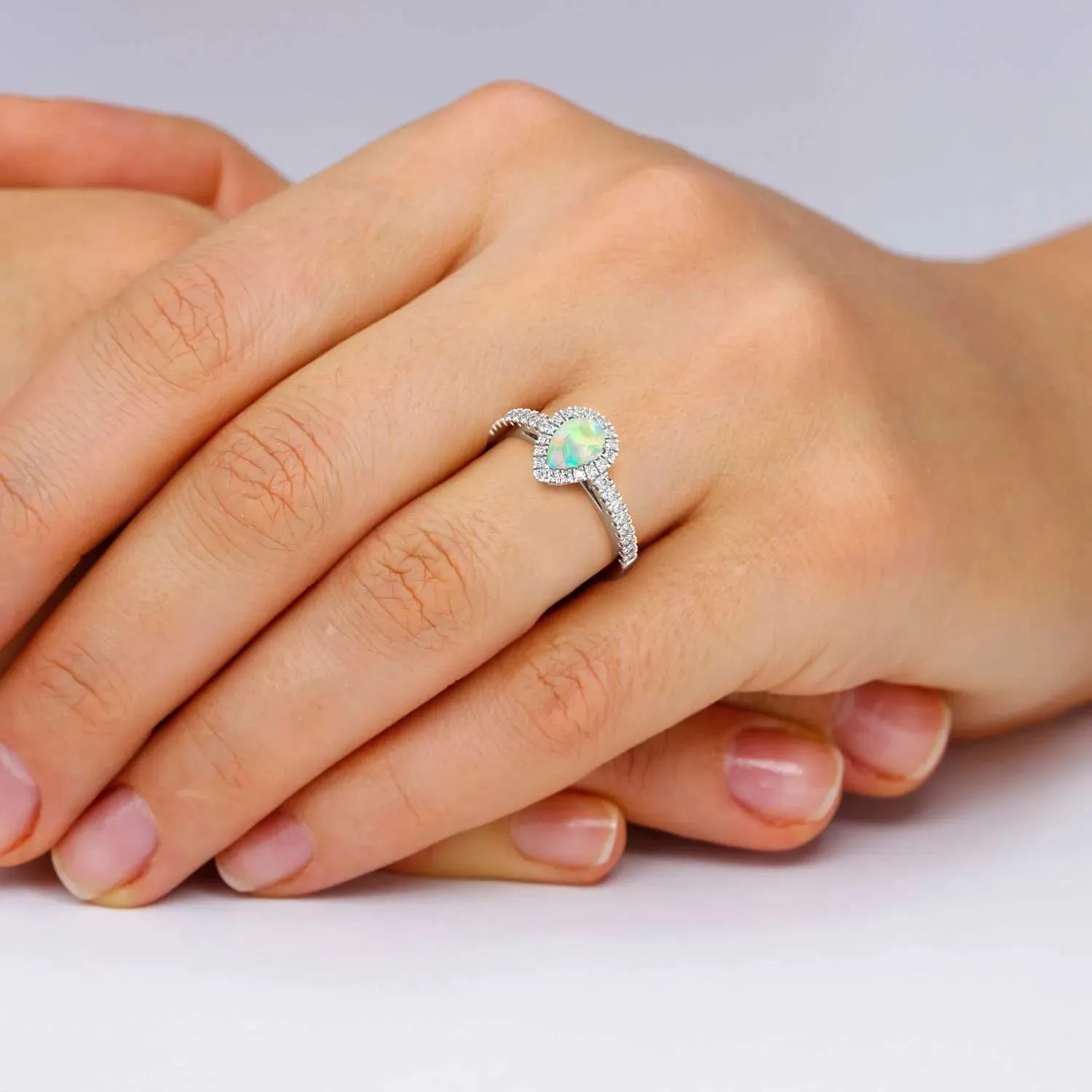 Pear Shape Halo Silver Opal Ring by Irosk Australia