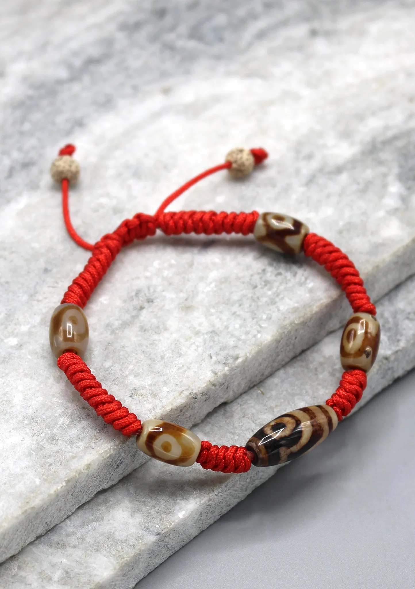 Two Eyes Dzi Bead in Lucky Knots Bracelet